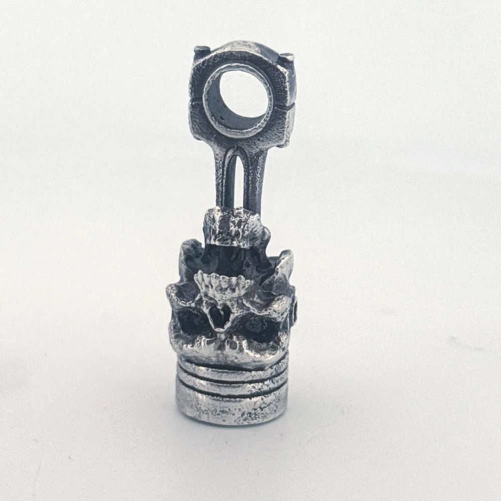 Skull Piston hand-poured 999+ silver statue by Gold Spartan