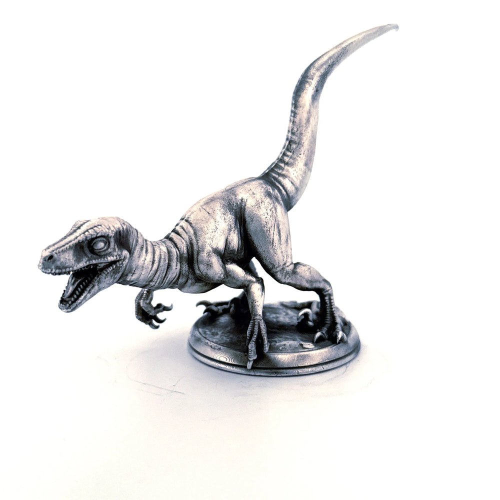 Velociraptor hand-poured 999+ silver statue by Gold Spartan