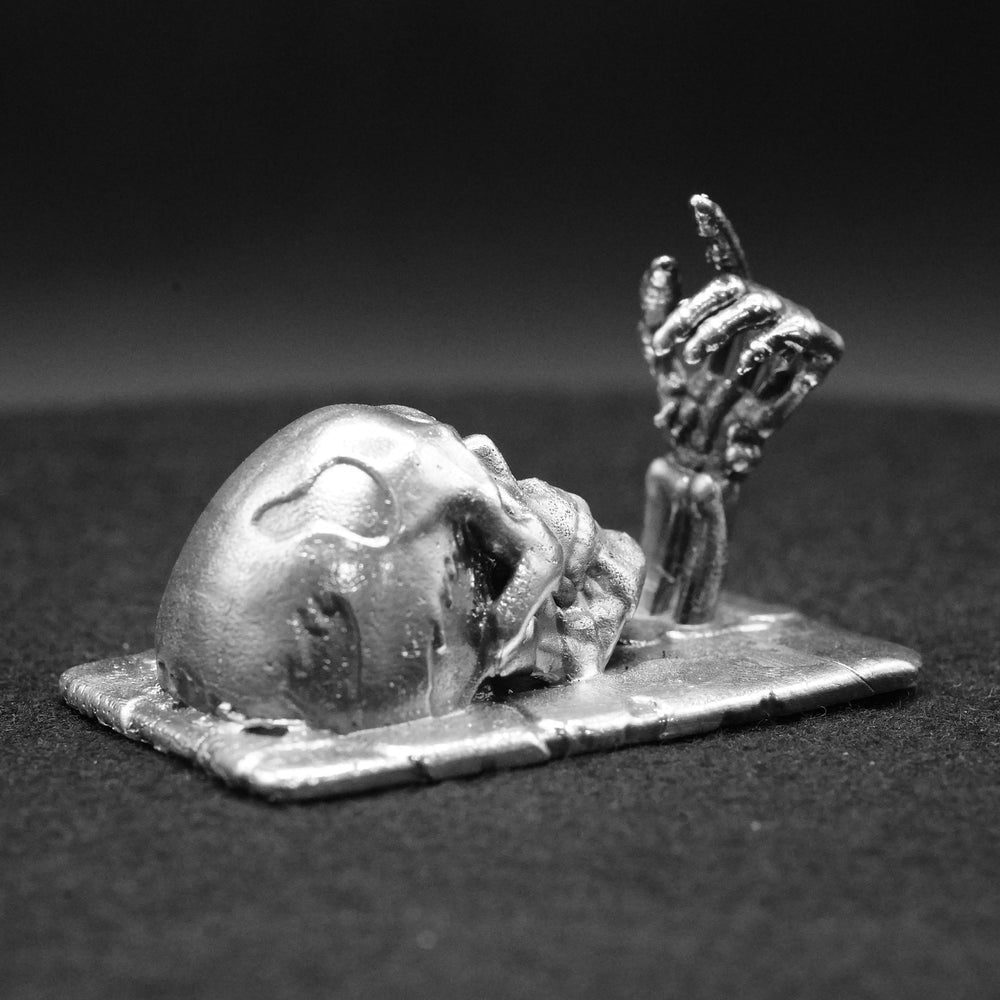 Dripping Skull hand-poured 999+ silver statue by Gold Spartan
