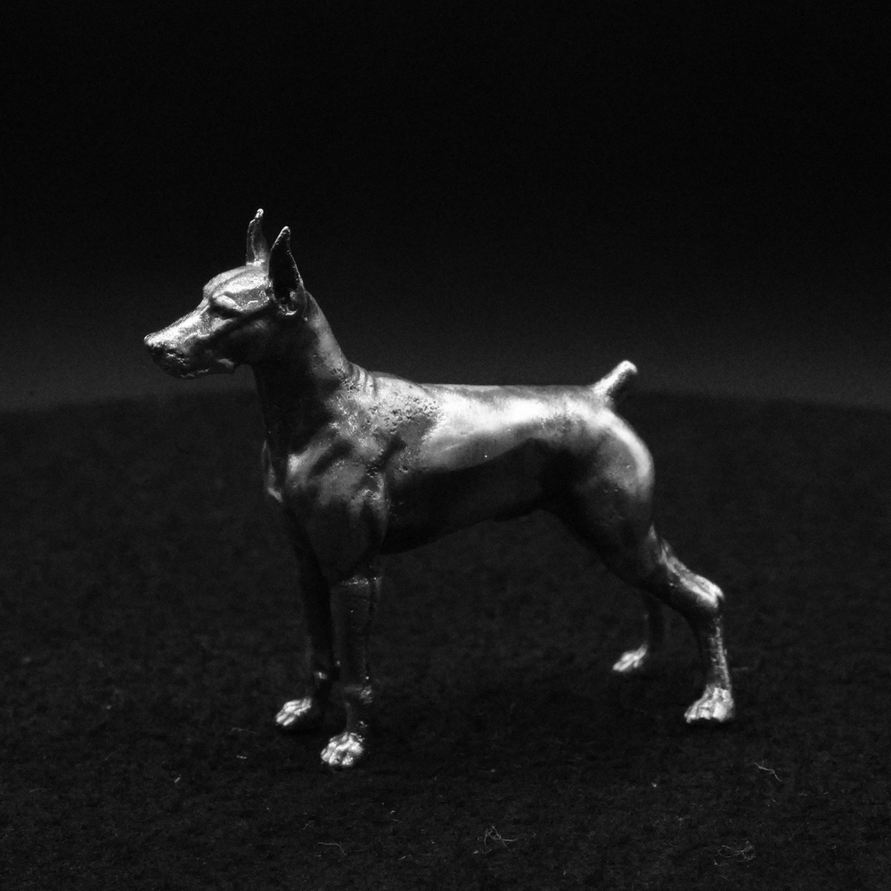 Doberman hand poured 999 silver statue collectible by Gold Spartan