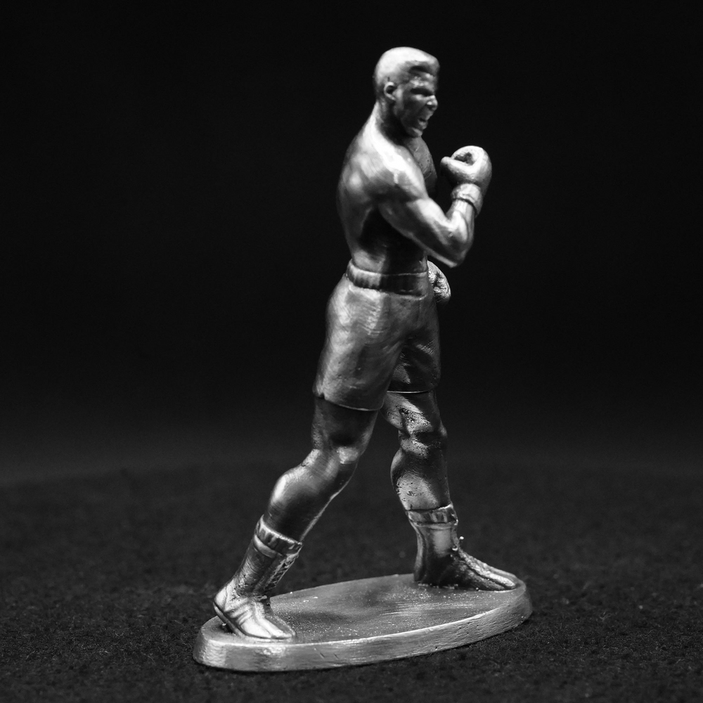 Muhammad Ali hand poured 999 silver statue collectible by Gold Spartan