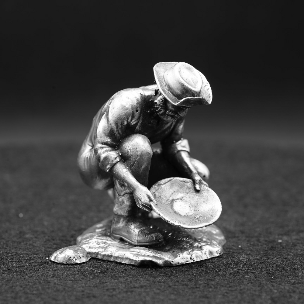 Prospector hand poured 999 silver statue collectible by Gold Spartan