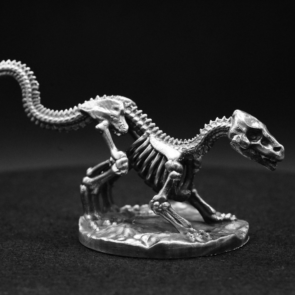 Raptor Skeleton hand-poured 999+ silver statue by Gold Spartan