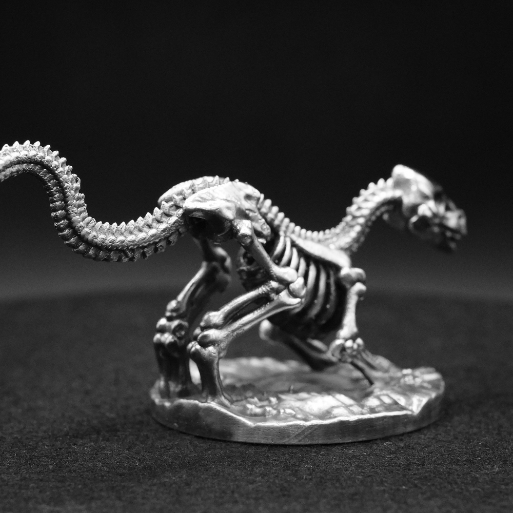 Raptor Skeleton hand-poured 999+ silver statue by Gold Spartan