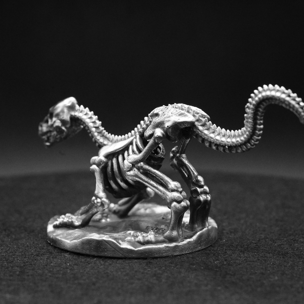 Raptor Skeleton hand-poured 999+ silver statue by Gold Spartan