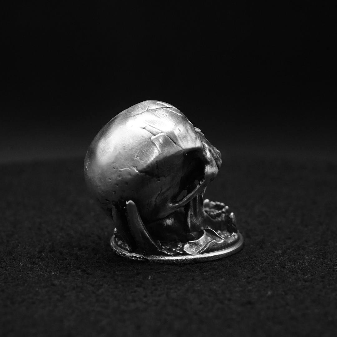 Skull Cave hand poured 999 silver statue collectible by Gold Spartan