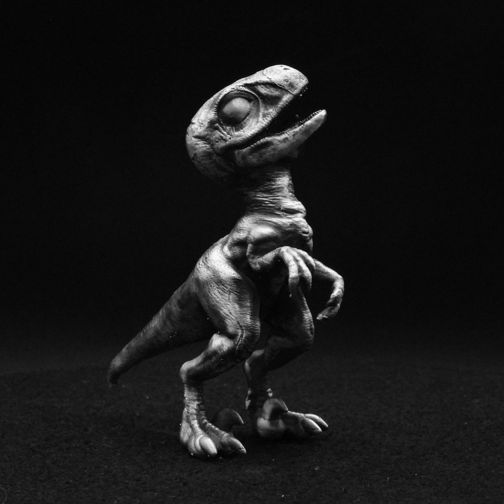 Young Velociraptor hand-poured 999+ silver statue by Gold Spartan