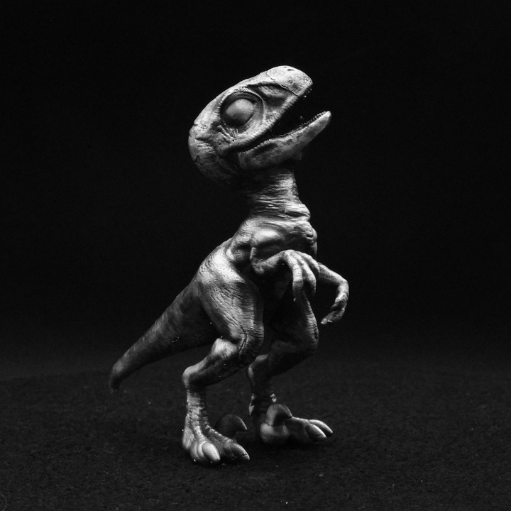 Young Velociraptor hand poured 999 silver statue collectible by Gold Spartan