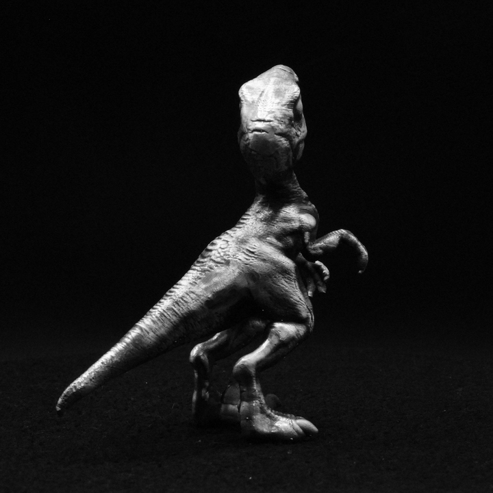 Young Velociraptor hand poured 999 silver statue collectible by Gold Spartan