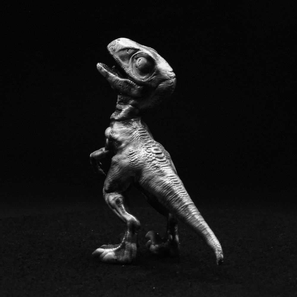 Young Velociraptor hand-poured 999+ silver statue by Gold Spartan