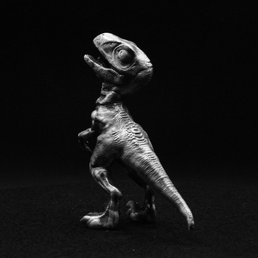 Young Velociraptor hand poured 999 silver statue collectible by Gold Spartan