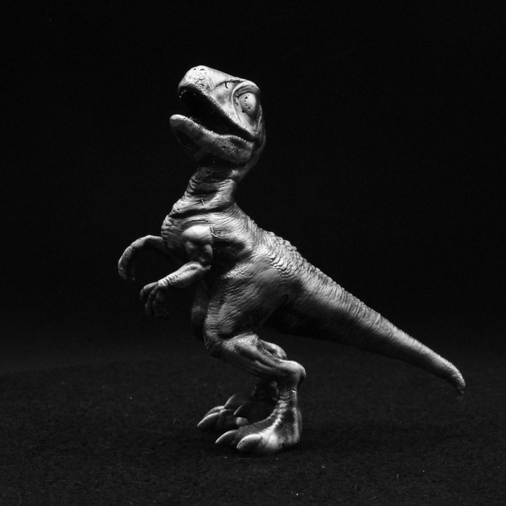 Young Velociraptor hand poured 999 silver statue collectible by Gold Spartan