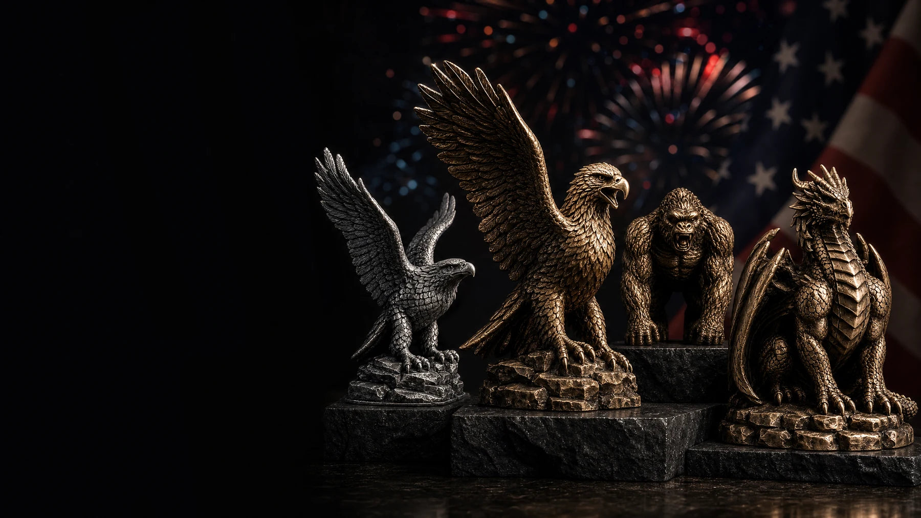 Bronze and silver collectible statues with a patriotic 4th of July fireworks and flag backdrop
